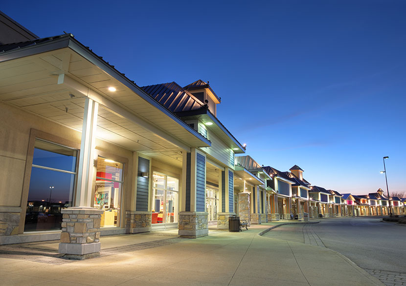 Retail strip center at dusk